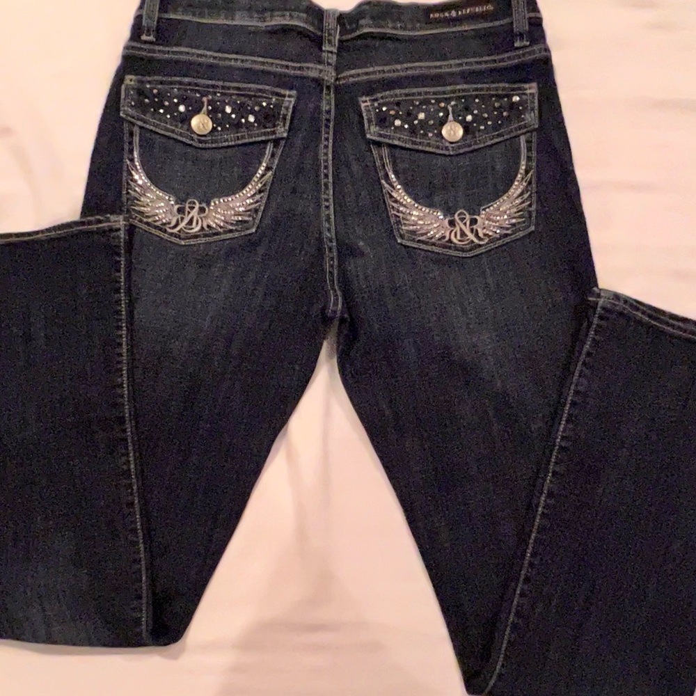 Nice jeans, pre loved but lots of wear left in them. Has bling on pockets.